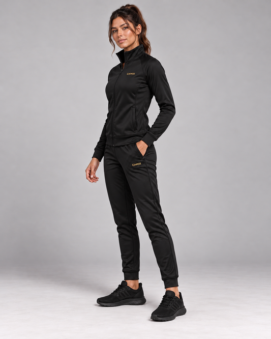 CAMIX Performance Trainingspak Dames zwart met gouden logo – zijaanzicht